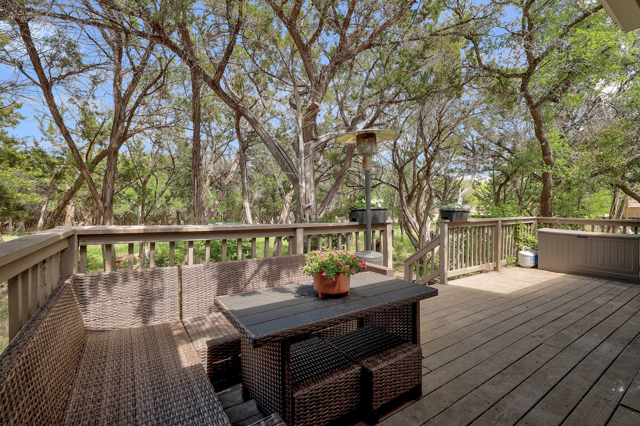 1455 County Road 262 Georgetown, TX 78633 - Photo 24 of 40 a view of a deck with wooden floor and outdoor seating