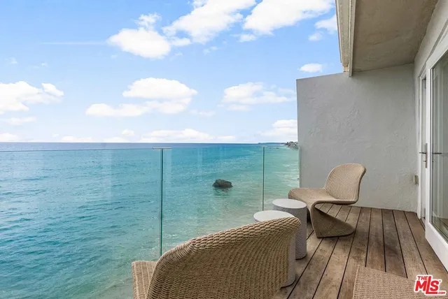 a view of a terrace with chairs