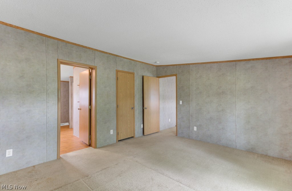 1110 Fort Road Southwest Dellroy, OH 44620 - Photo 15 of 50 Master bedroom features a walk in closet