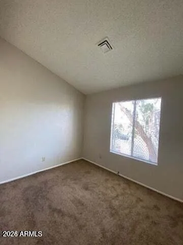 a bathroom with a sink a toilet a mirror and shower