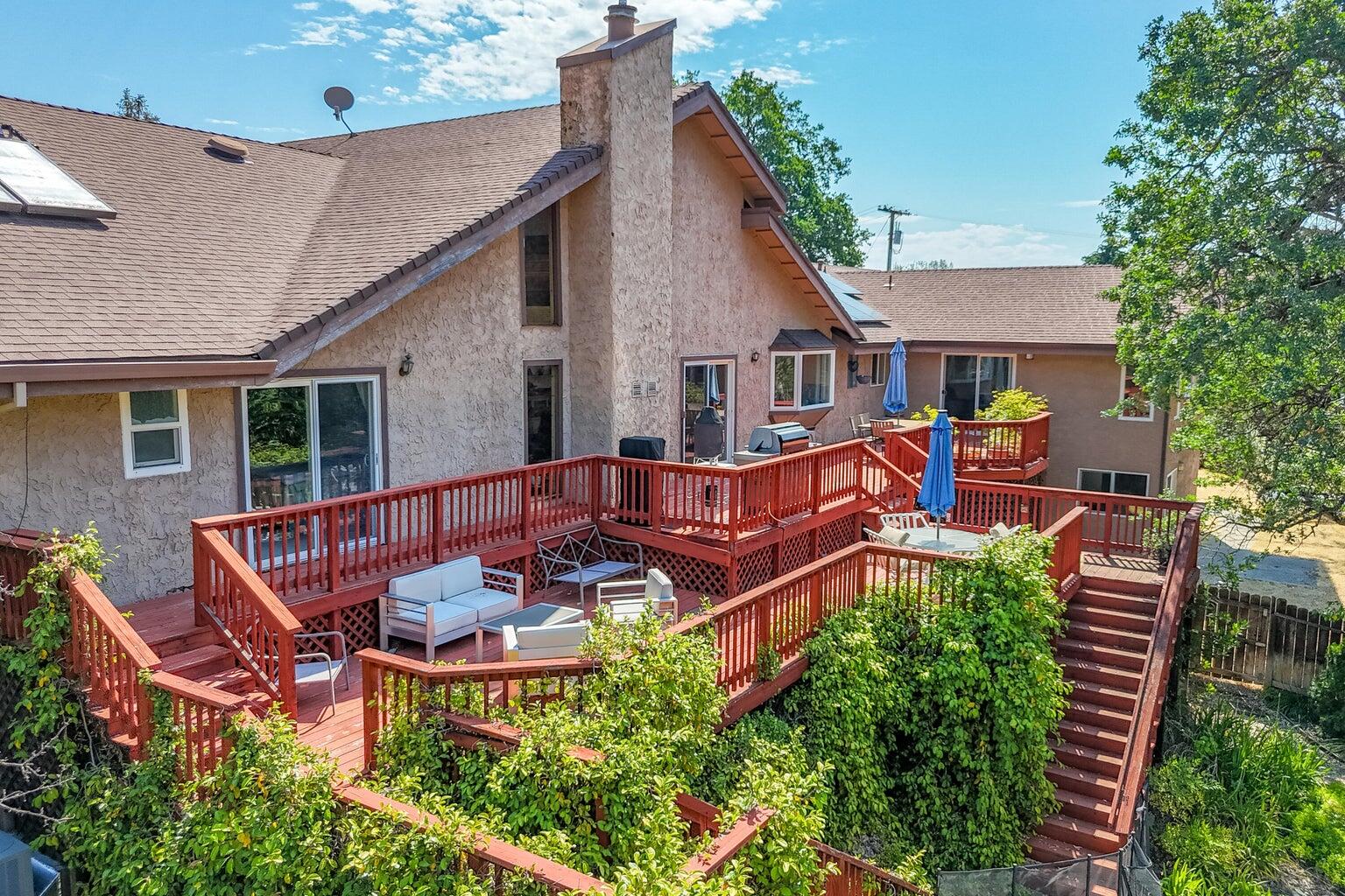 8846 Goldstone Lane Redding, CA 96001 - Photo 63 of 64 an aerial view of a house with swimming pool and sitting area