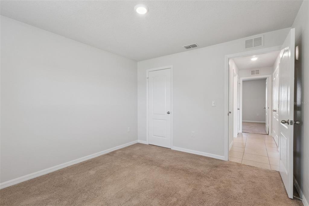 1613 Orne Street Mascotte, FL 34753 - Photo 22 of 31 a view of an empty room