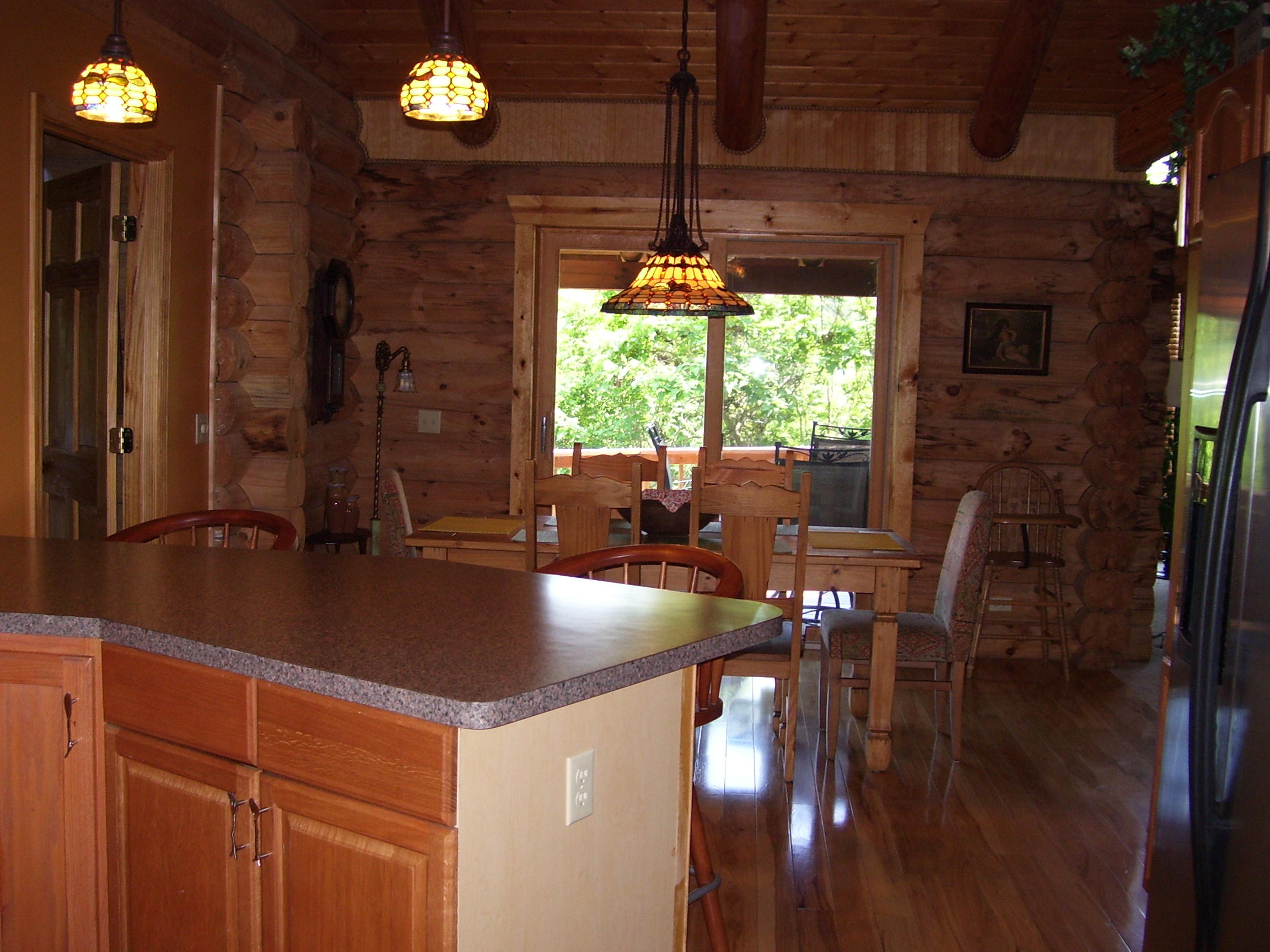 341 Shoreside Road New Tazewell, TN 37825 - Photo 9 of 35 Kitchen to dining to deck