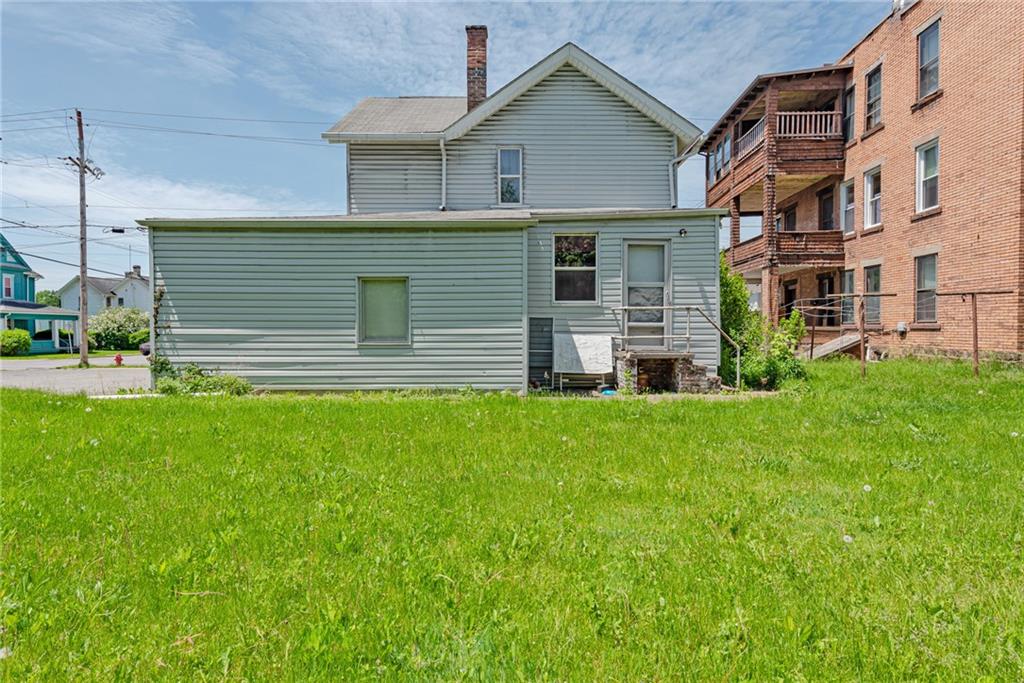 125 North Chestnut Street Butler, PA 16001 - Photo 22 of 25 a front view of house with yard and outdoor seating