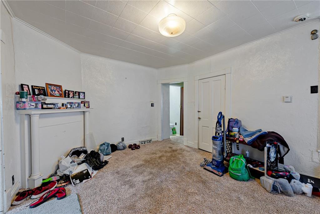 125 North Chestnut Street Butler, PA 16001 - Photo 7 of 25 a room with gym equipment and a mirror