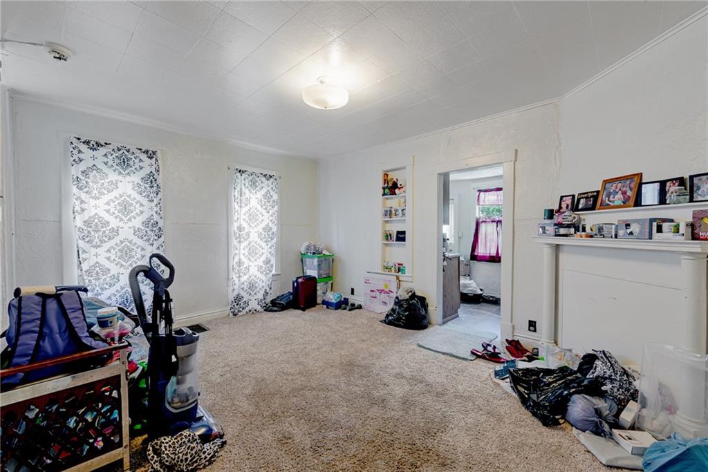 125 North Chestnut Street Butler, PA 16001 - Photo 9 of 25 a room with gym equipment and a large window