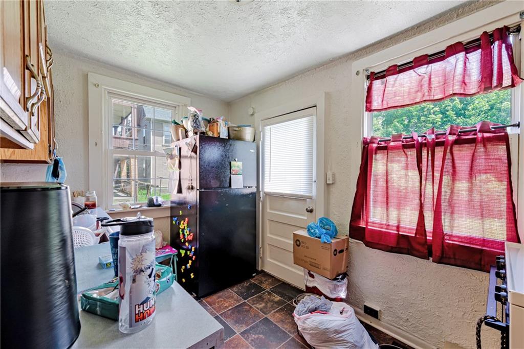125 North Chestnut Street Butler, PA 16001 - Photo 10 of 25 a living room with furniture and a window