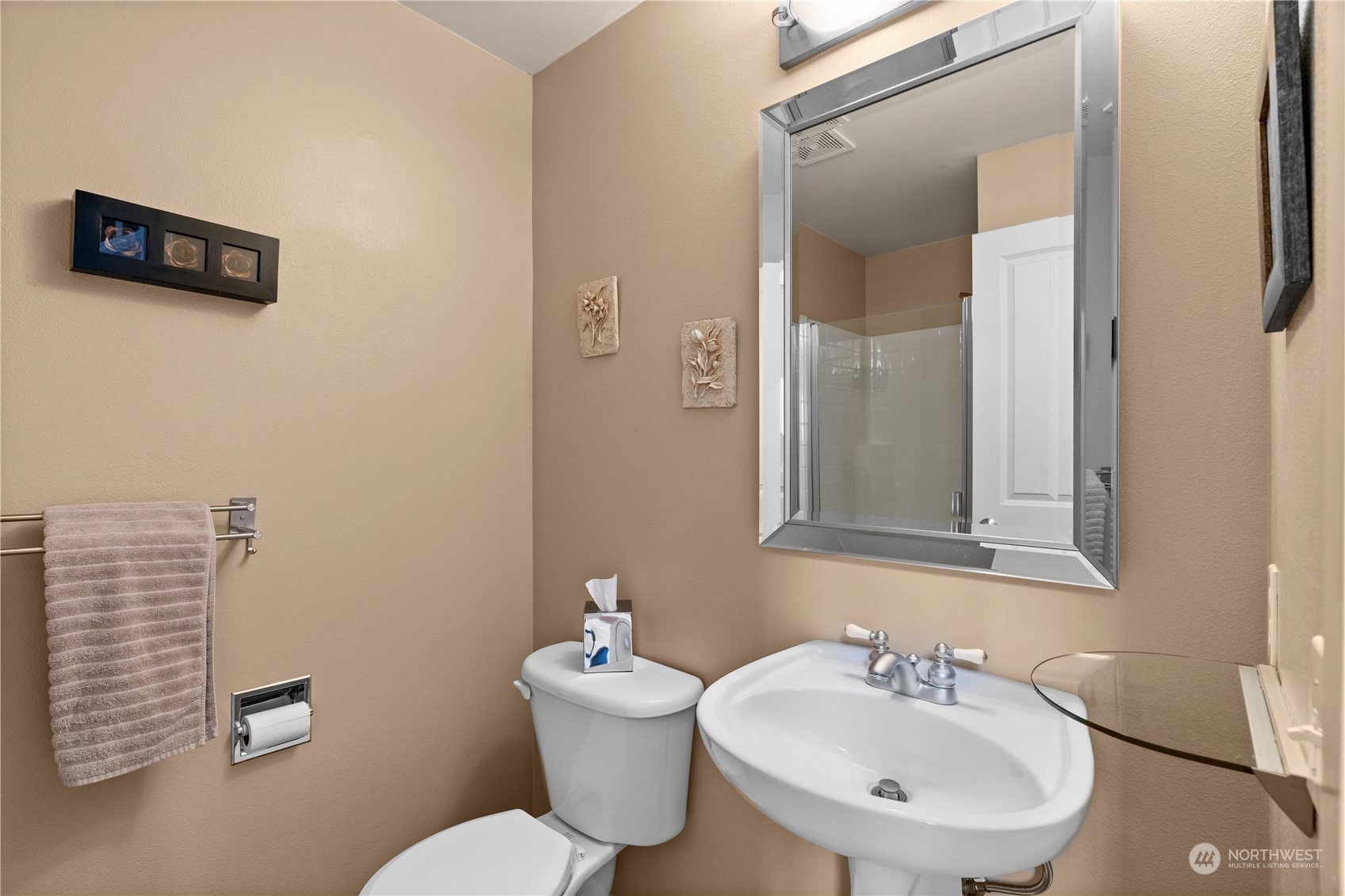 27325 Maple Ridge Way Southeast Maple Valley, WA 98038 - Photo 20 of 40 a bathroom with a toilet a sink and mirror