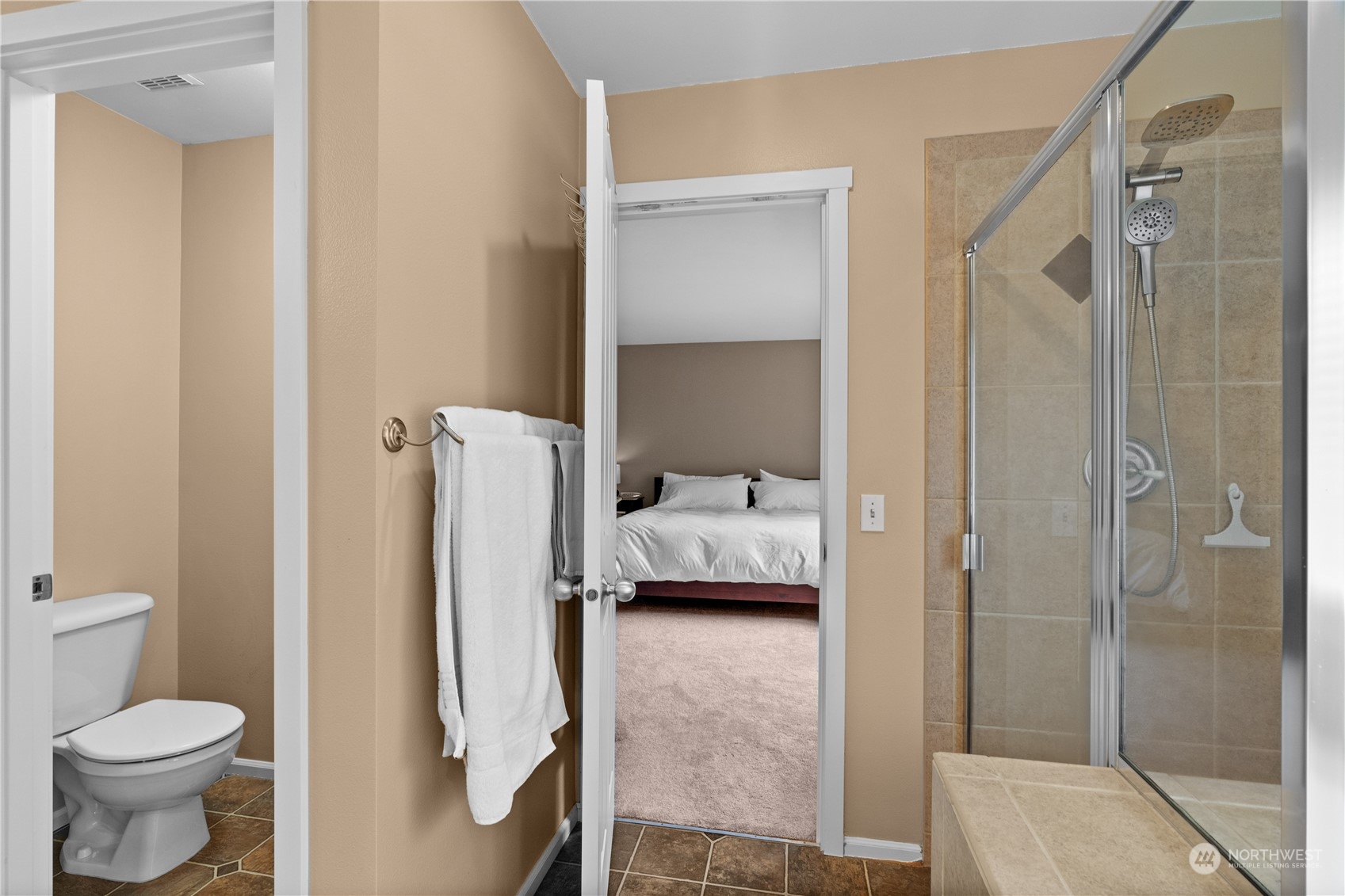 27325 Maple Ridge Way Southeast Maple Valley, WA 98038 - Photo 21 of 40 a bathroom with a toilet and a shower