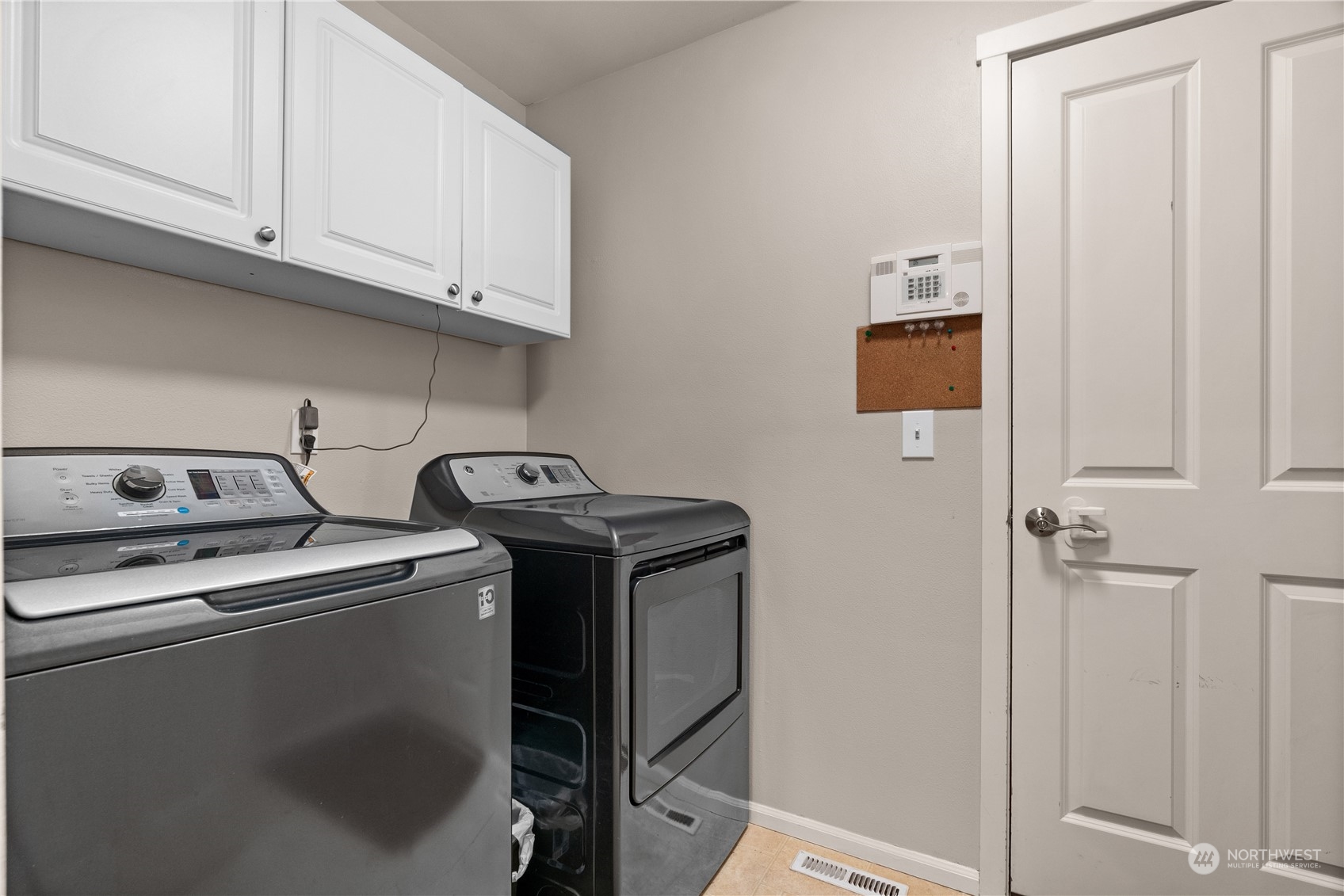 27325 Maple Ridge Way Southeast Maple Valley, WA 98038 - Photo 22 of 40 a utility room with dryer and washer