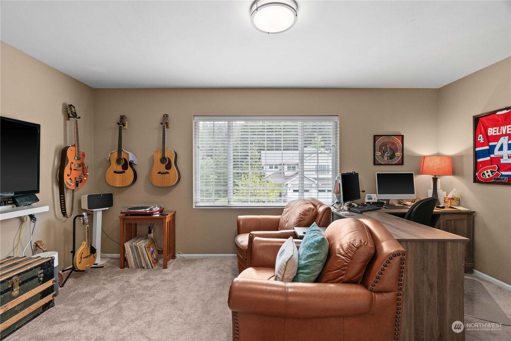 27325 Maple Ridge Way Southeast Maple Valley, WA 98038 - Photo 30 of 40 a living room with furniture a window and a flat screen tv