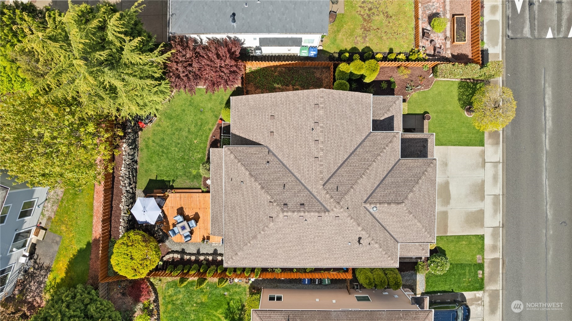 27325 Maple Ridge Way Southeast Maple Valley, WA 98038 - Photo 38 of 40 an aerial view of a house with a yard and trees