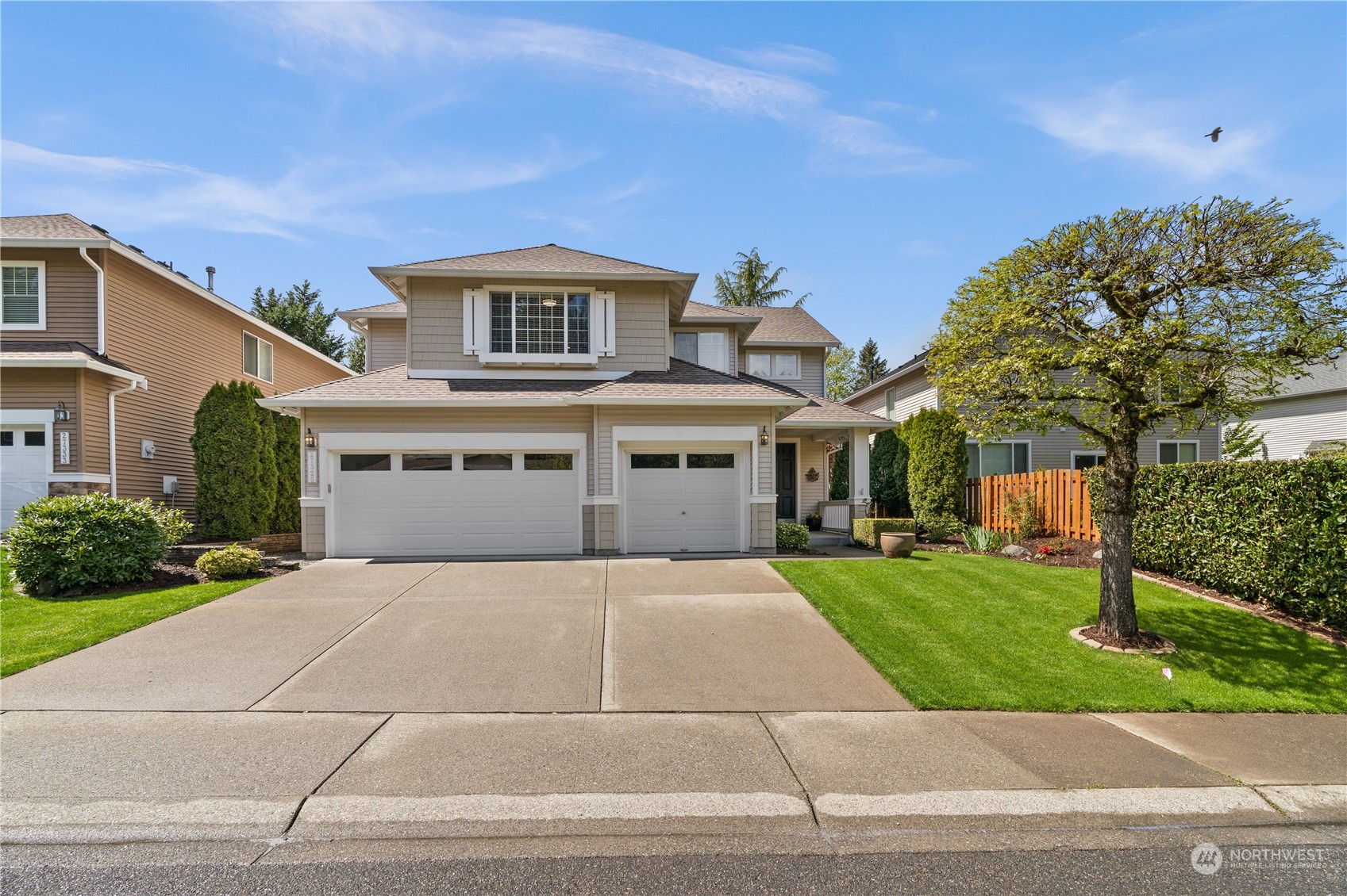 27325 Maple Ridge Way Southeast Maple Valley, WA 98038 - Photo 39 of 40 a front view of house with yard and green space
