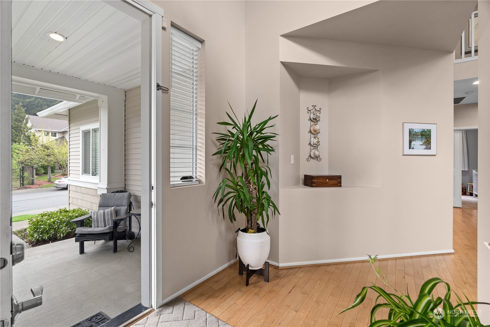 27325 Maple Ridge Way Southeast Maple Valley, WA 98038 - Photo 5 of 40 a living room with furniture and a potted plant