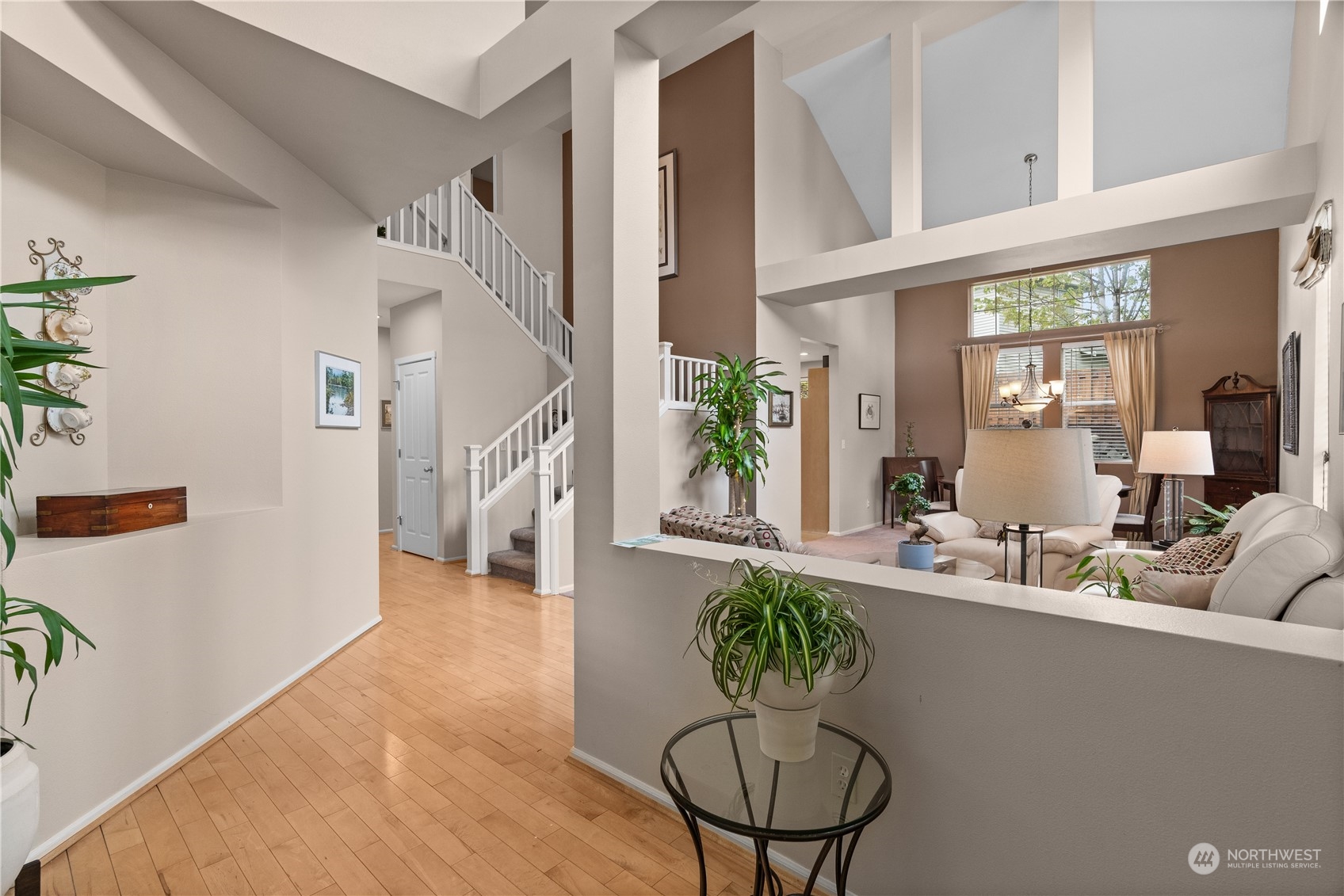 27325 Maple Ridge Way Southeast Maple Valley, WA 98038 - Photo 6 of 40 a living room with furniture and a large window