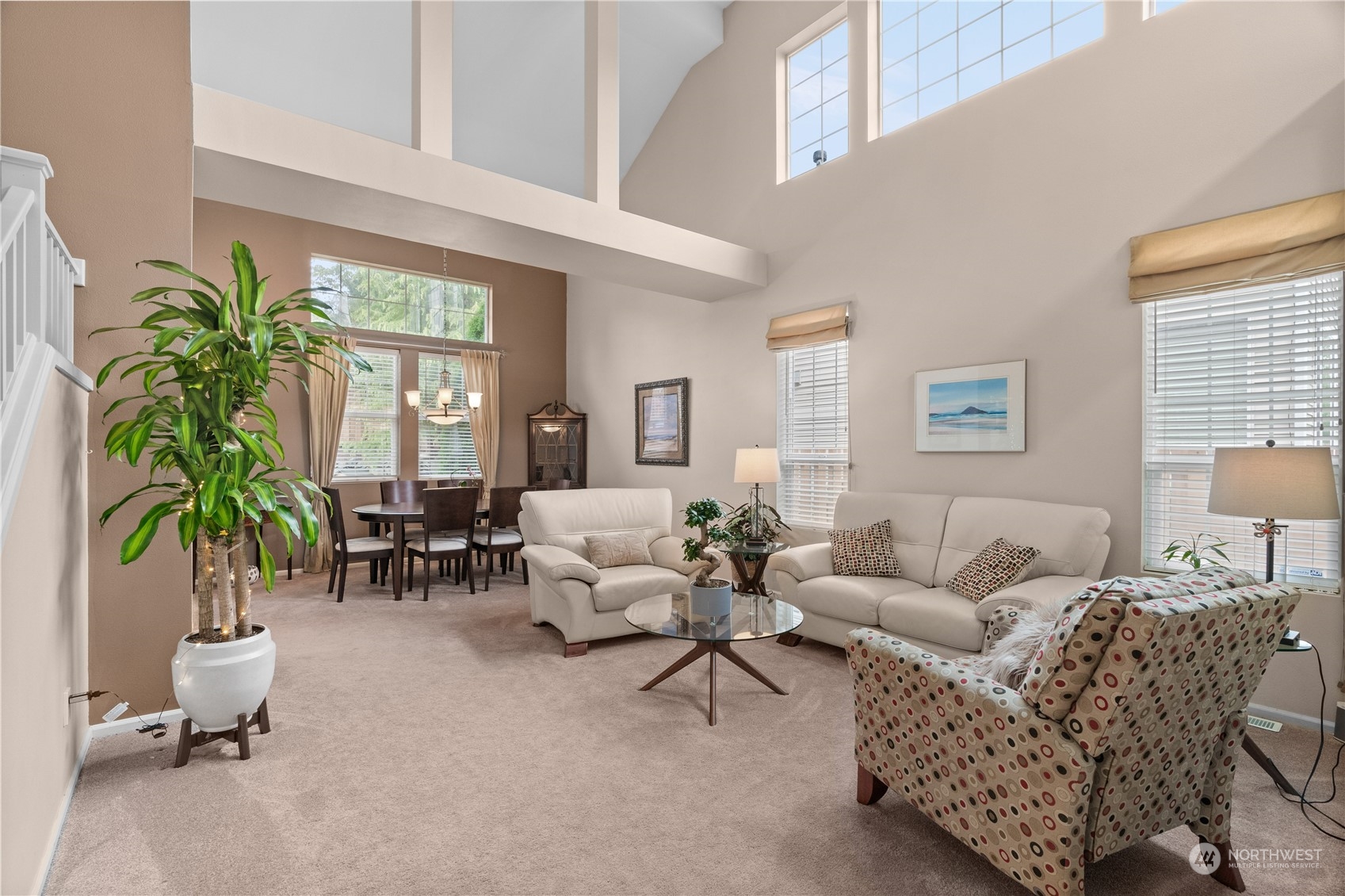 27325 Maple Ridge Way Southeast Maple Valley, WA 98038 - Photo 7 of 40 a living room with furniture and a large window