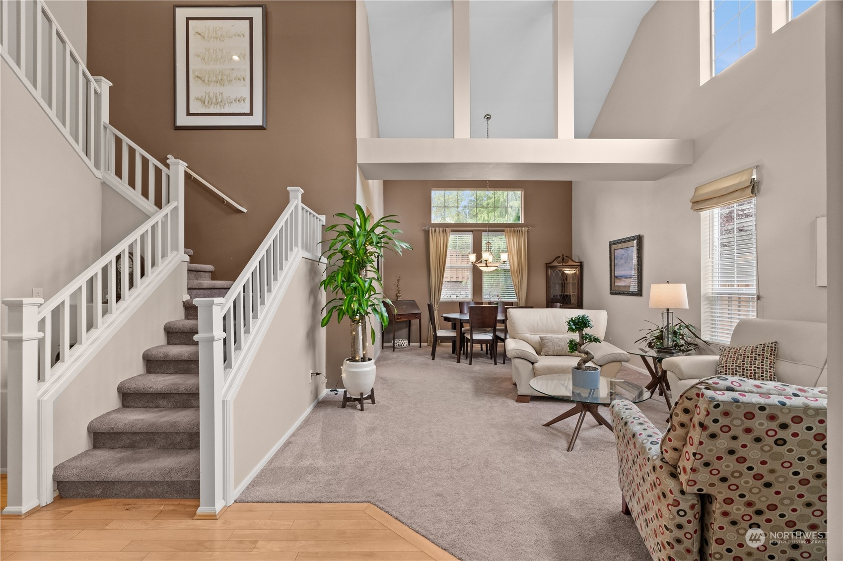 27325 Maple Ridge Way Southeast Maple Valley, WA 98038 - Photo 8 of 40 a living room with furniture and a potted plant