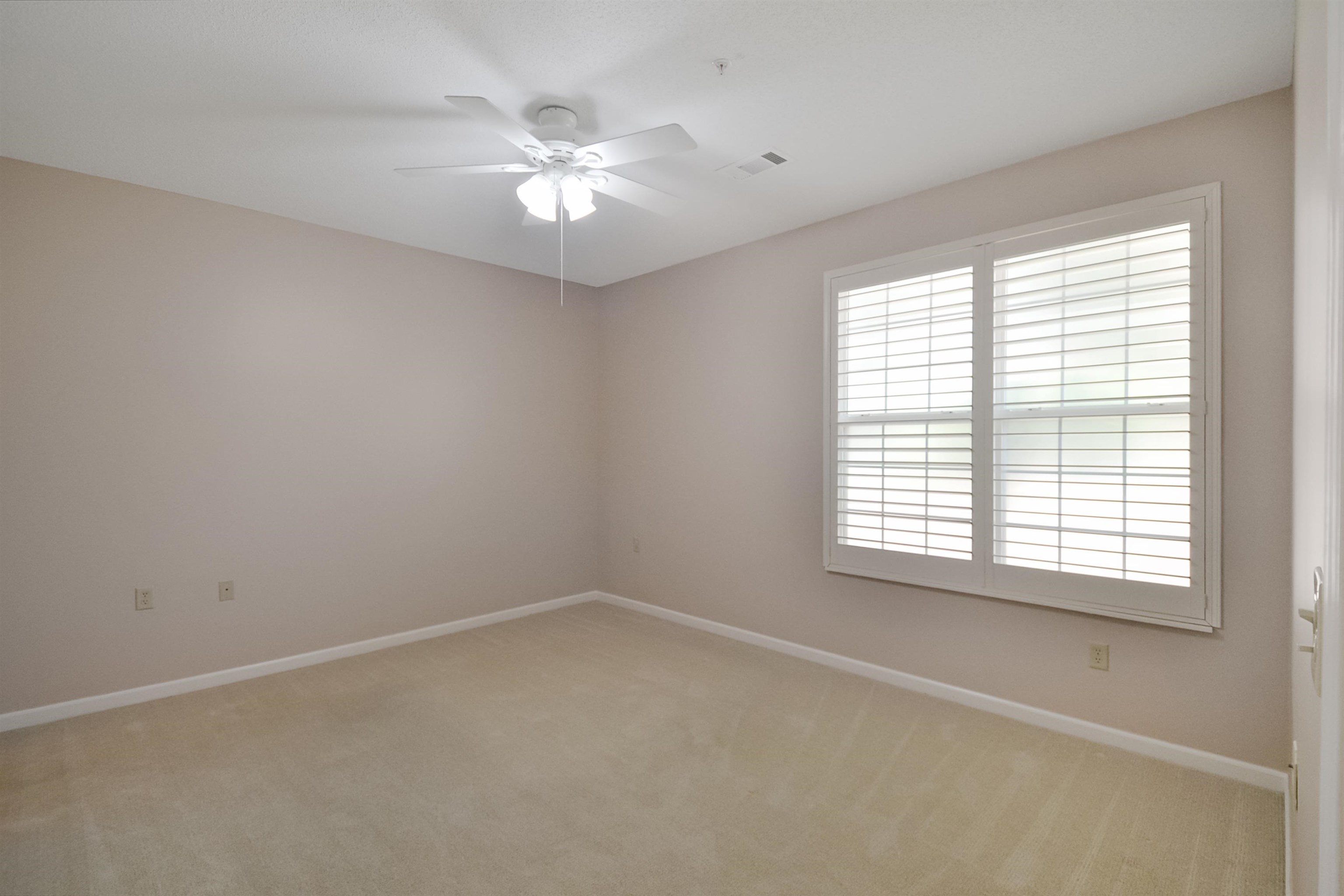 1201 Oak Timber Circle, Unit 29 Collierville, TN 38017 - Photo 12 of 32 an empty room with a window
