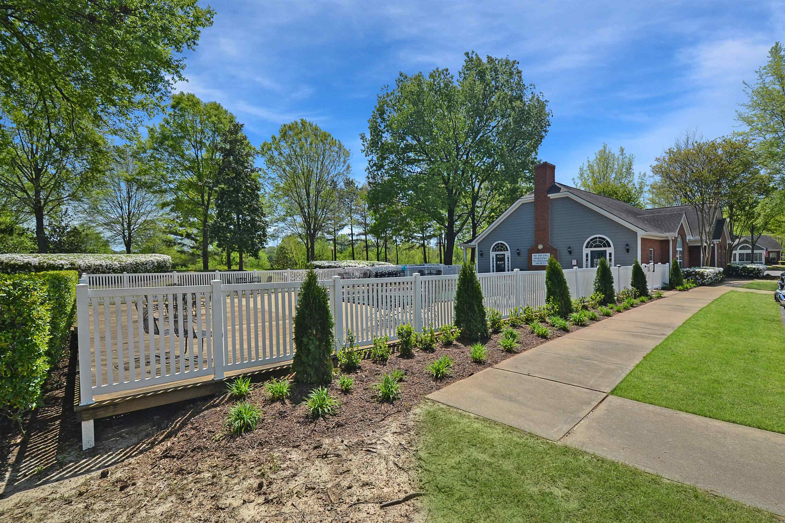1201 Oak Timber Circle, Unit 29 Collierville, TN 38017 - Photo 26 of 32 a front view of a house with garden