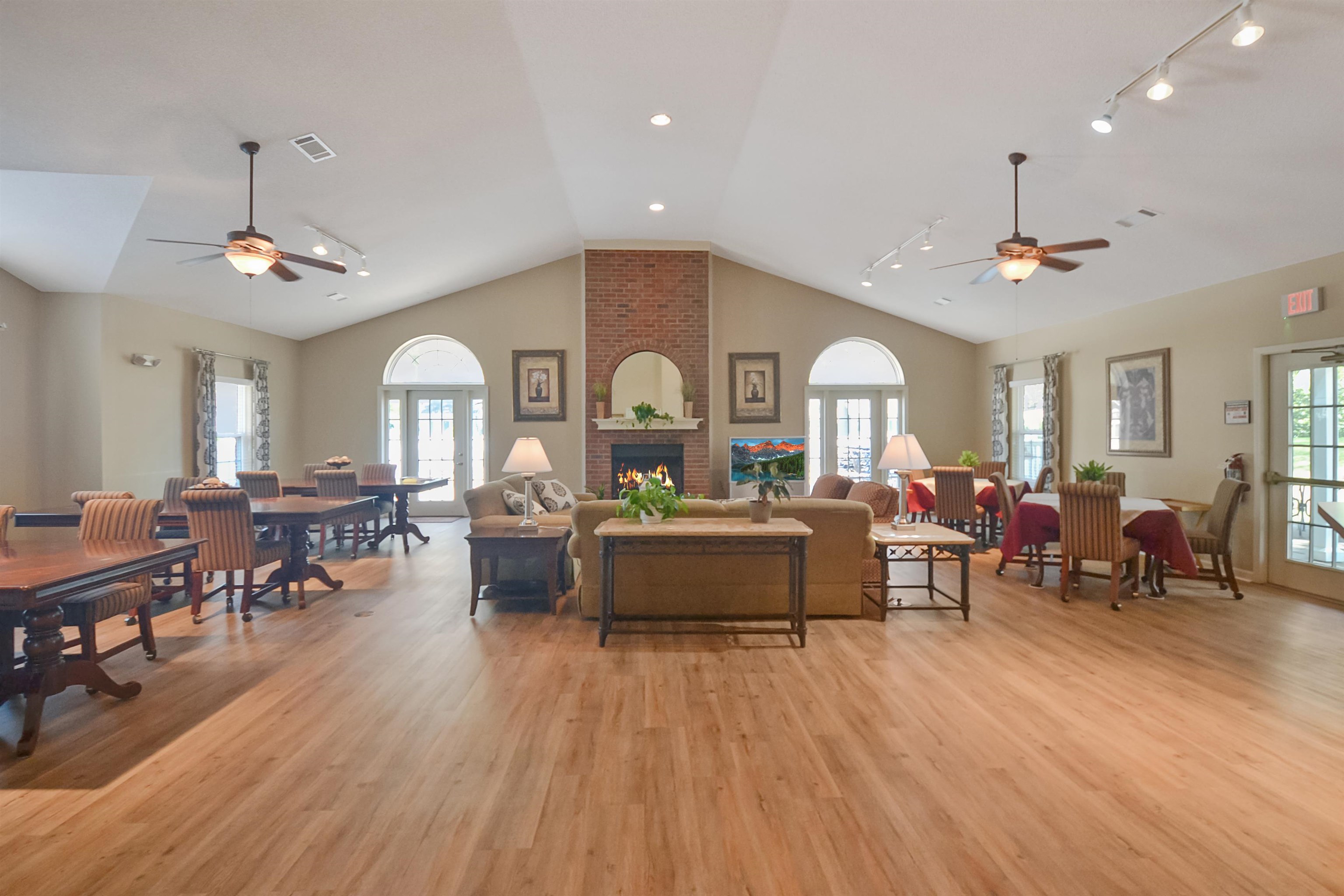 1201 Oak Timber Circle, Unit 29 Collierville, TN 38017 - Photo 31 of 32 a living room with lots of furniture and a chandelier