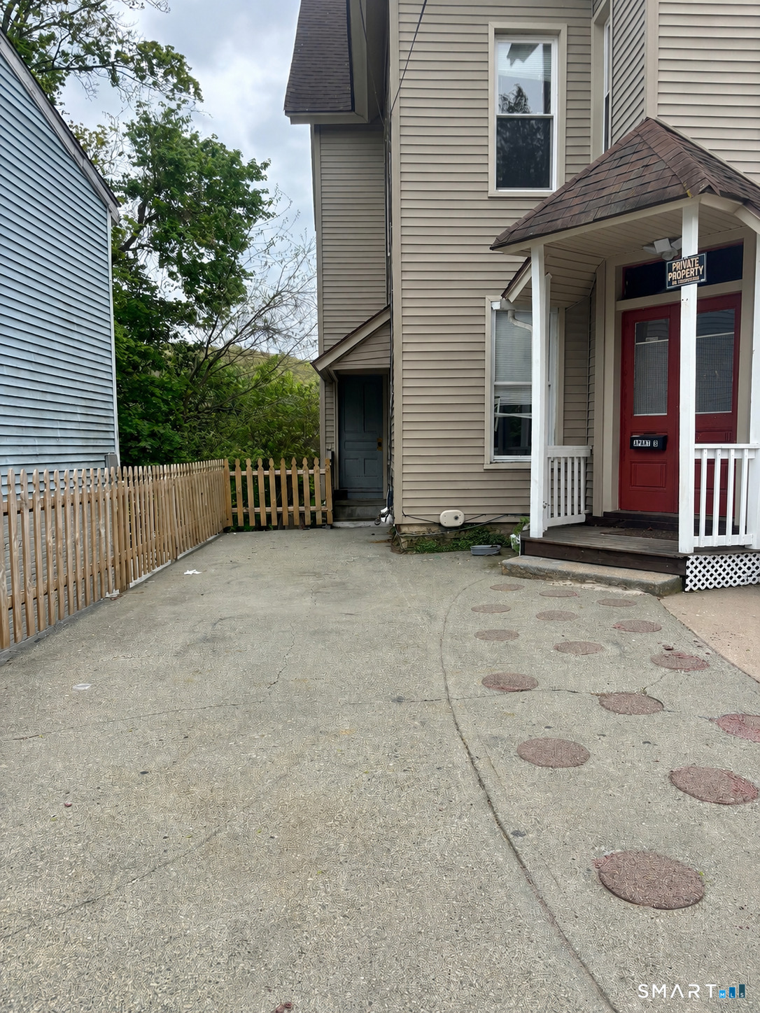 51-53 Cliff Street Norwich, CT 06360 - Photo 1 of 9 a view of a house with a patio