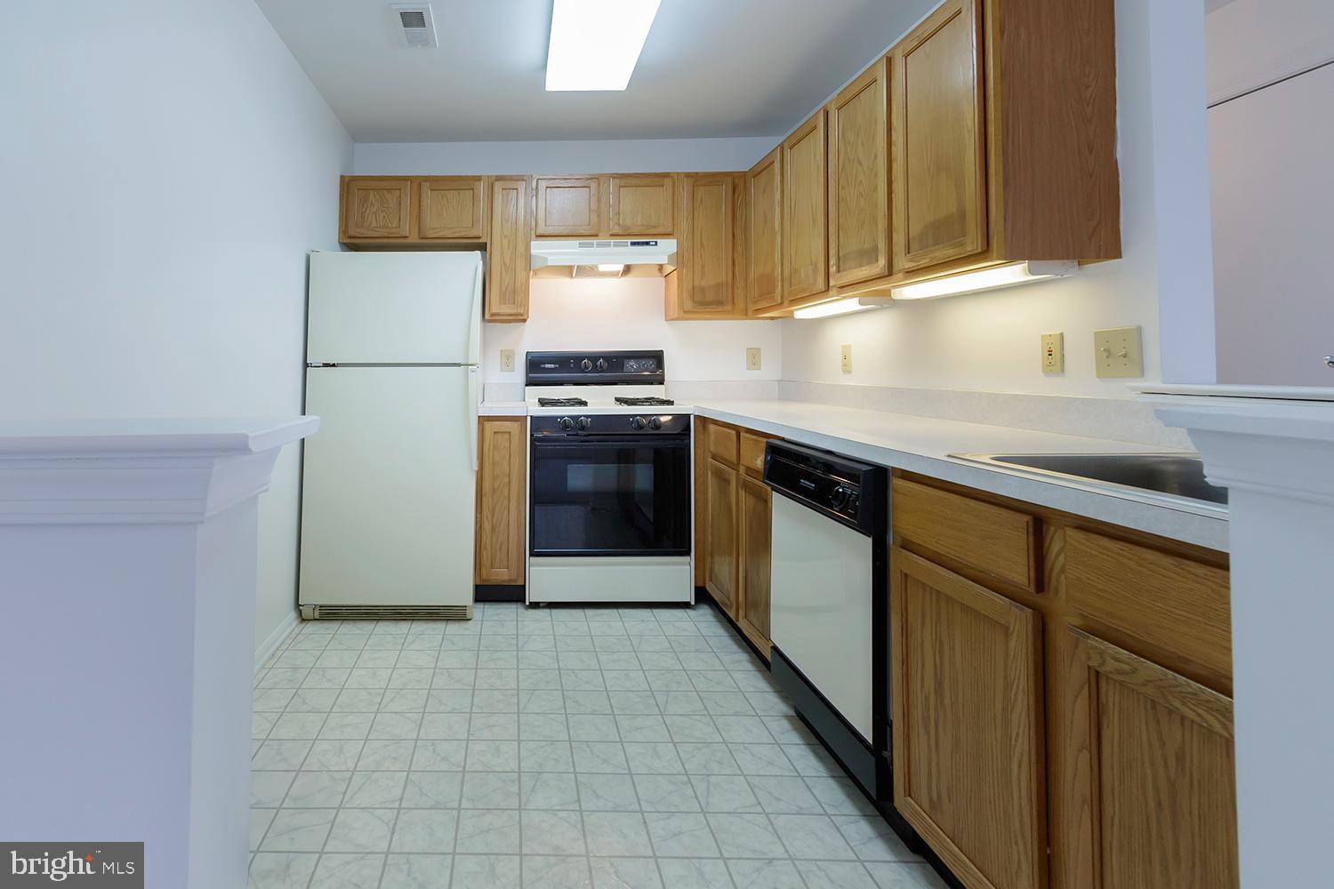 1602 Squirrel Road Marlton, NJ 08053 - Photo 15 of 21 a kitchen with stainless steel appliances granite countertop a stove a refrigerator and a sink