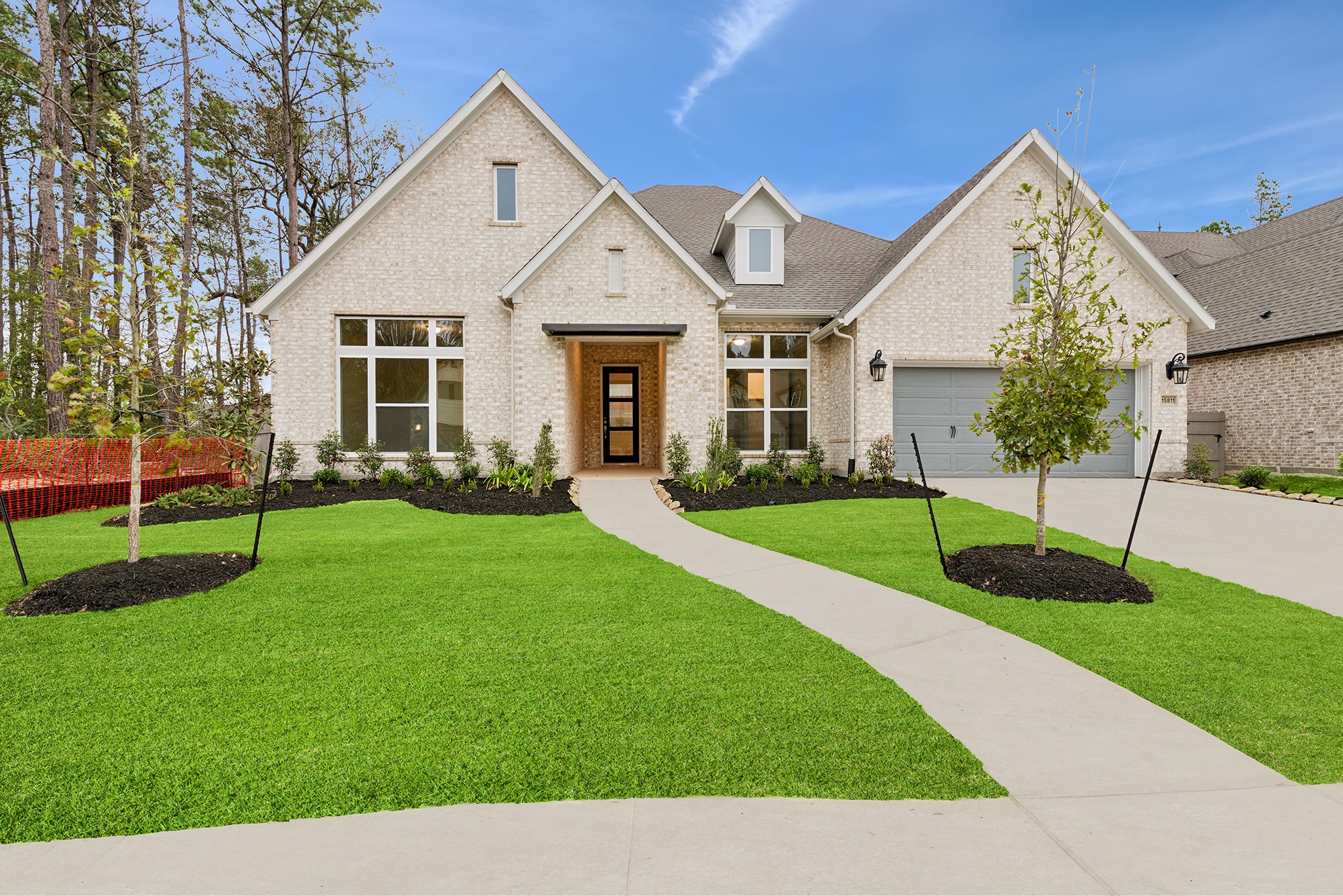 15811 Moran Meadow Street Conroe, TX 77302 - Photo 1 of 48 Welcome to The Lotus by David Weekley Homes.