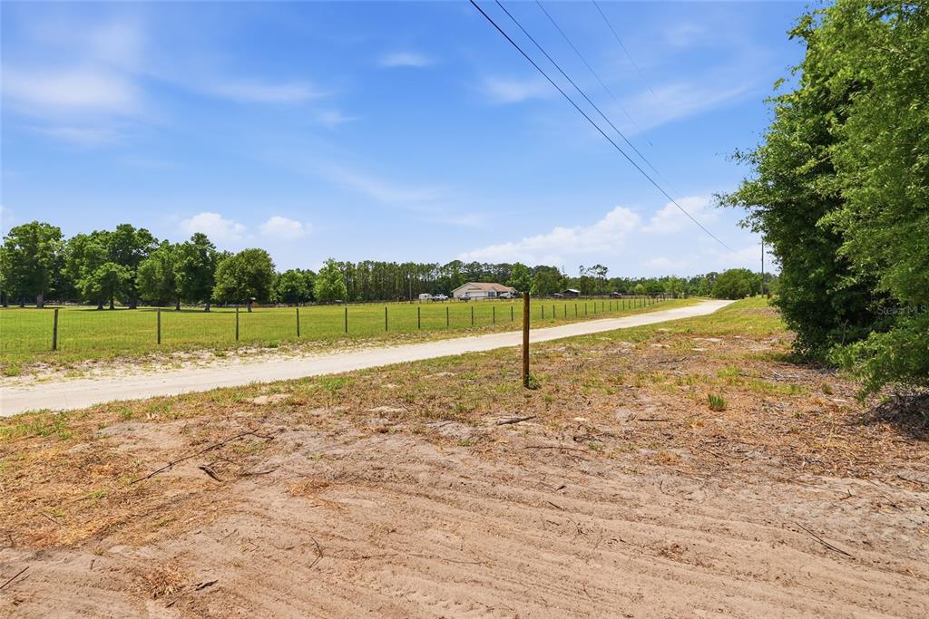 Southwest 188th Street Archer, FL 32618 - Photo 14 of 20 a view of a lake view with a big yard