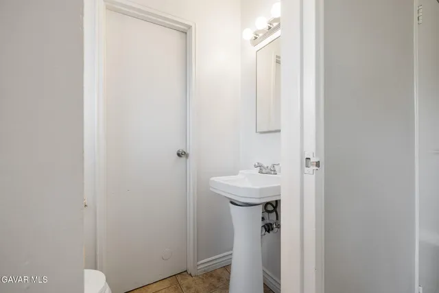 a view of swimming pool next to a yard