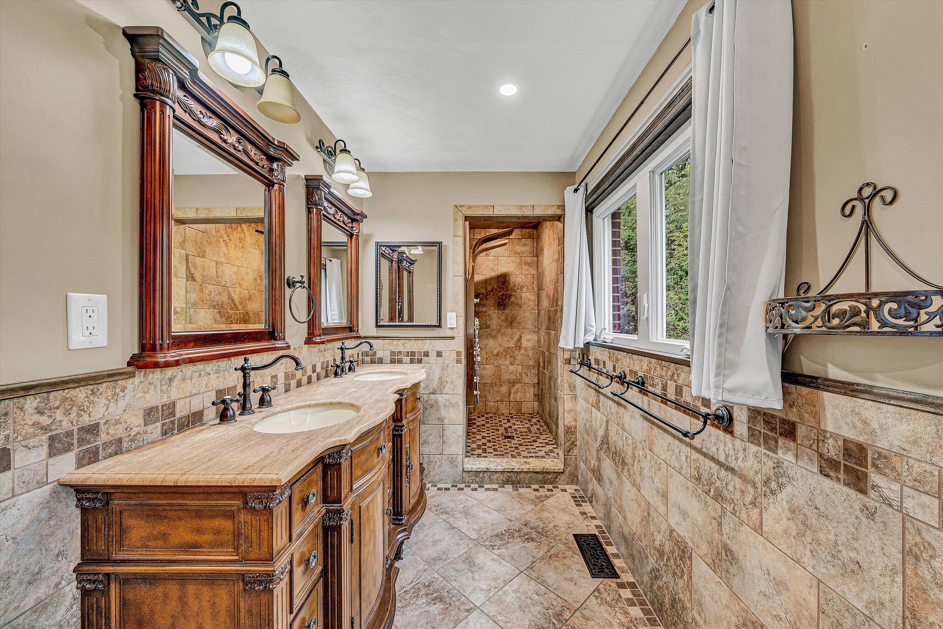 83 Springview Court Troutville, VA 24175 - Photo 18 of 74 a spacious bathroom with a sink double vanity and a mirror