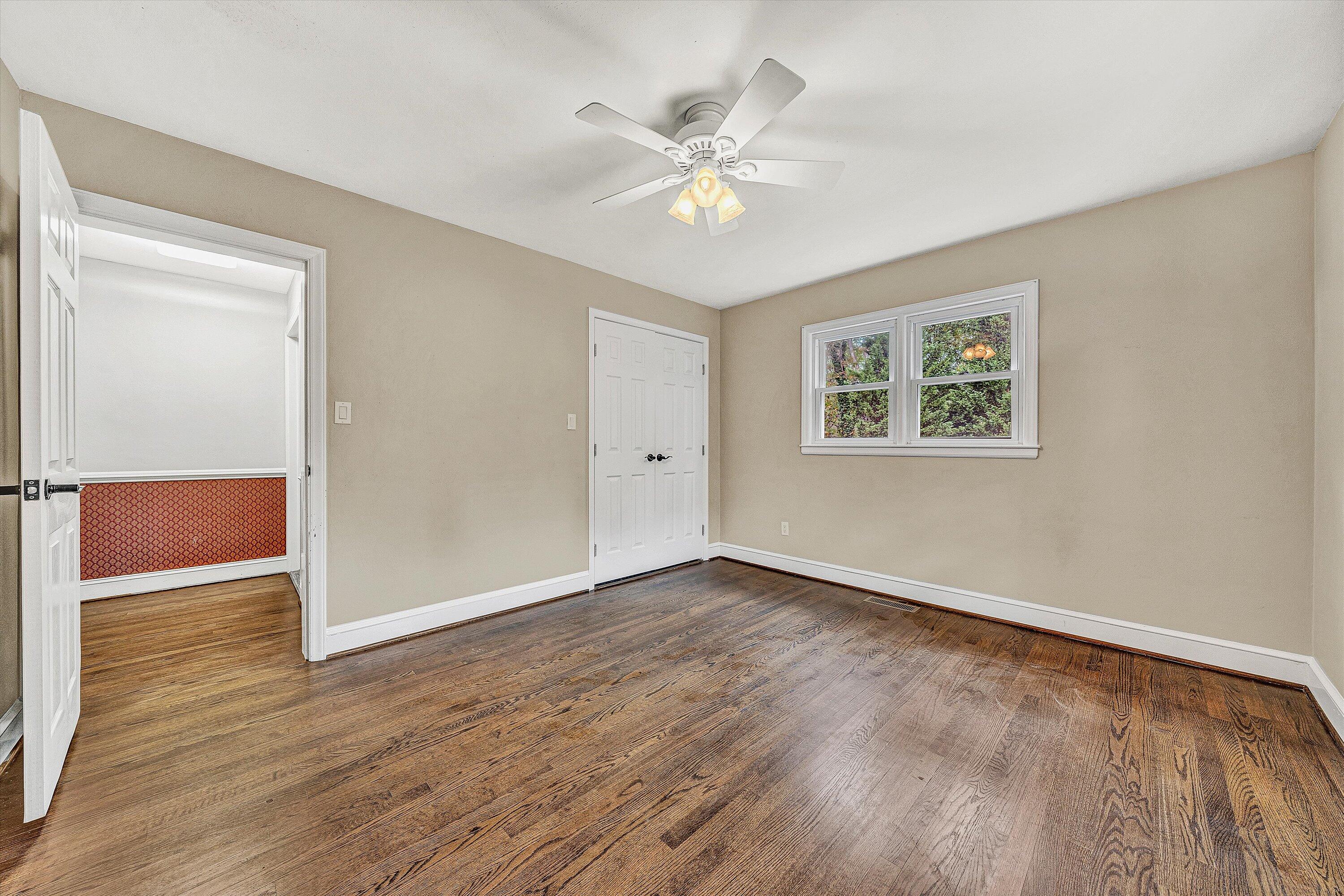 83 Springview Court Troutville, VA 24175 - Photo 22 of 74 a view of an empty room with wooden floor and a window