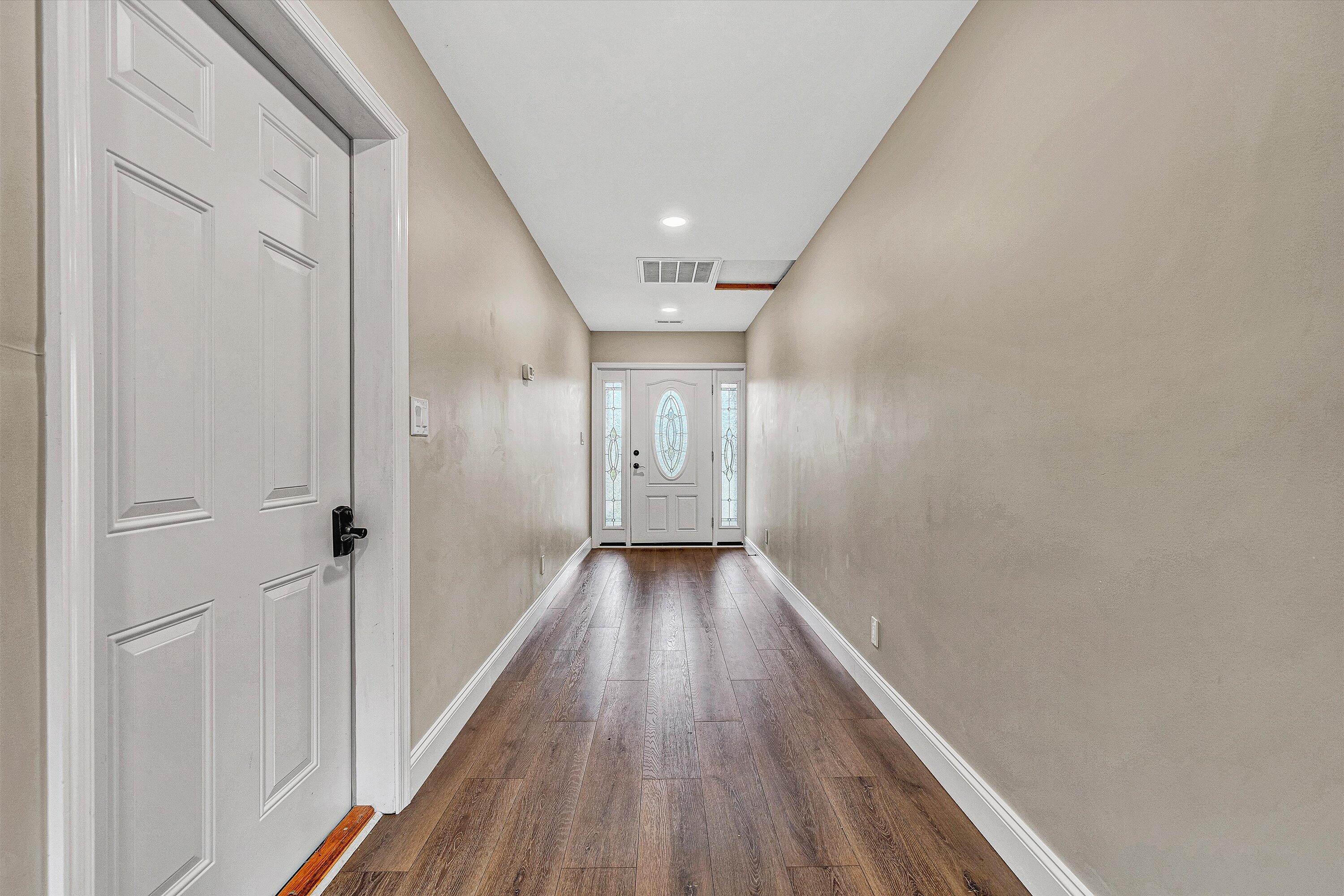 83 Springview Court Troutville, VA 24175 - Photo 25 of 74 a view of a hallway with wooden floor