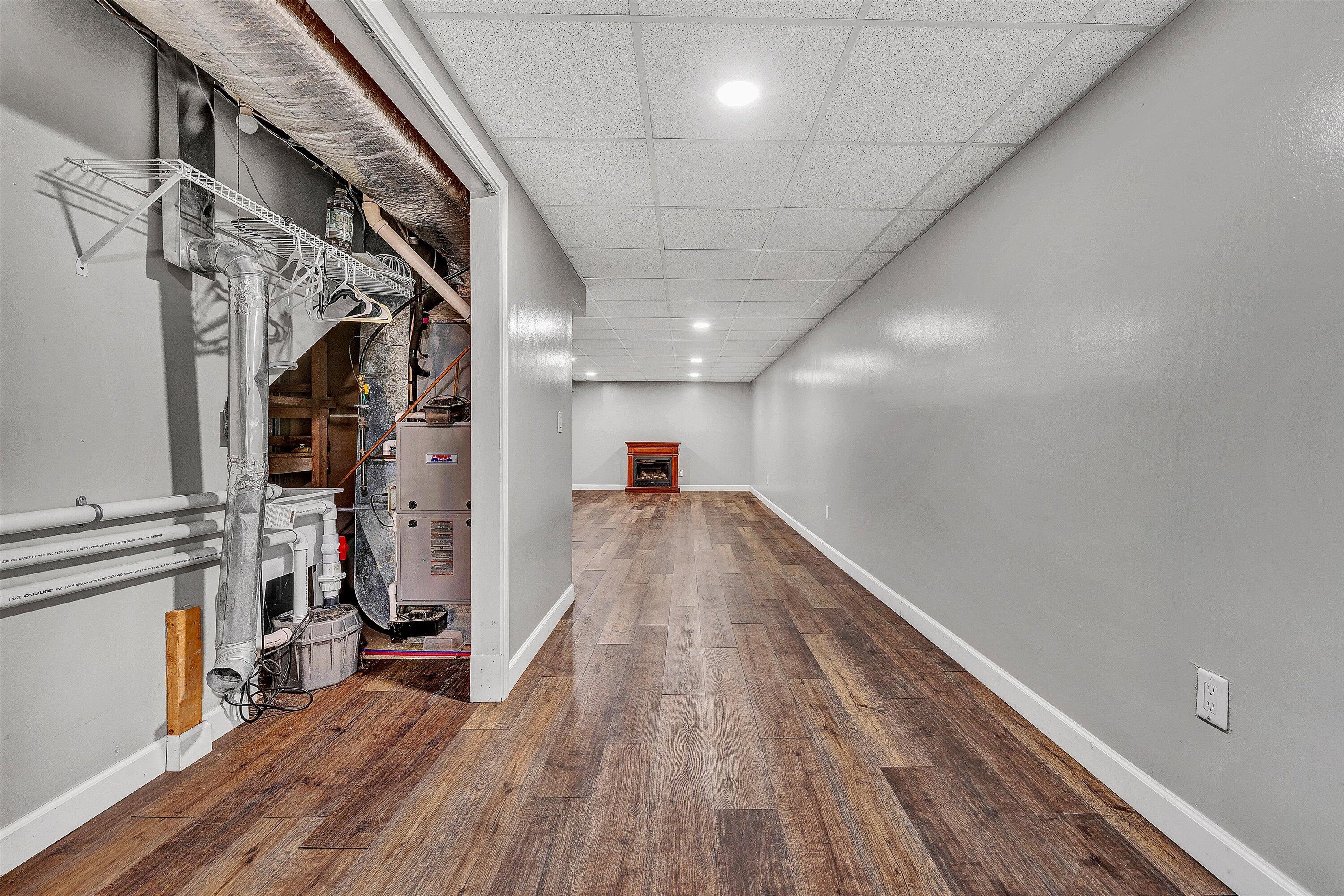 83 Springview Court Troutville, VA 24175 - Photo 41 of 74 a view of a hallway with wooden floor and staircase