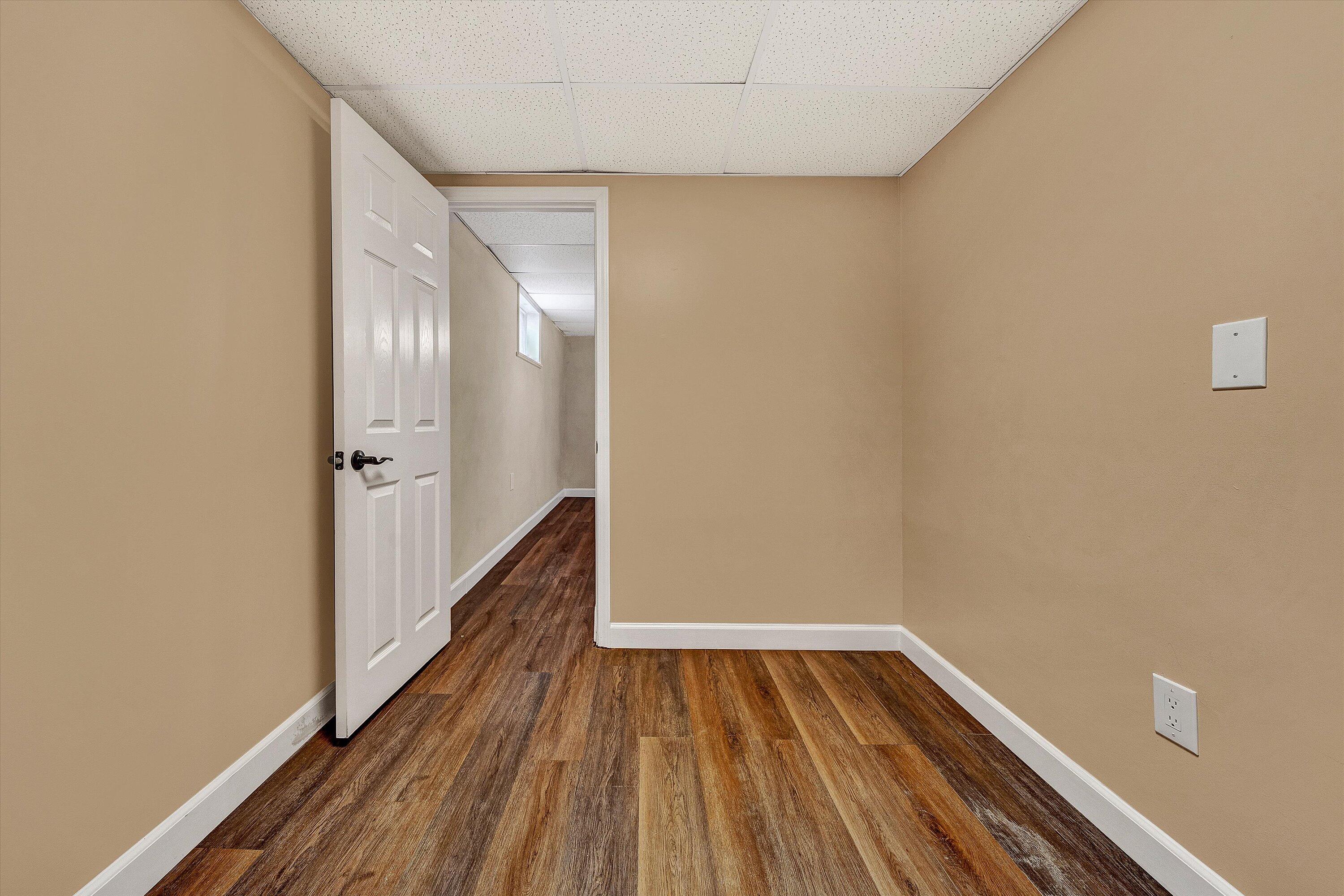 83 Springview Court Troutville, VA 24175 - Photo 47 of 74 a view of a hallway with wooden floor and staircase