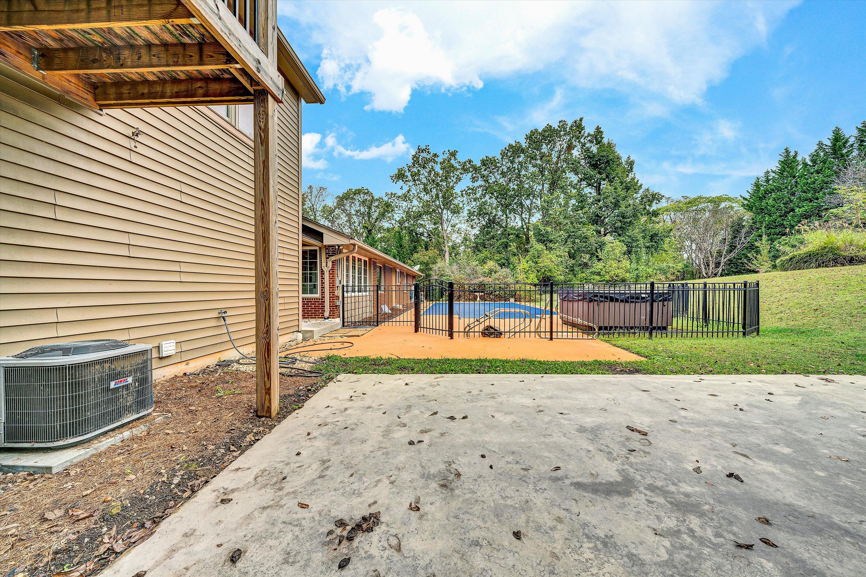 83 Springview Court Troutville, VA 24175 - Photo 52 of 74 a view of a backyard with a garden and entertaining space