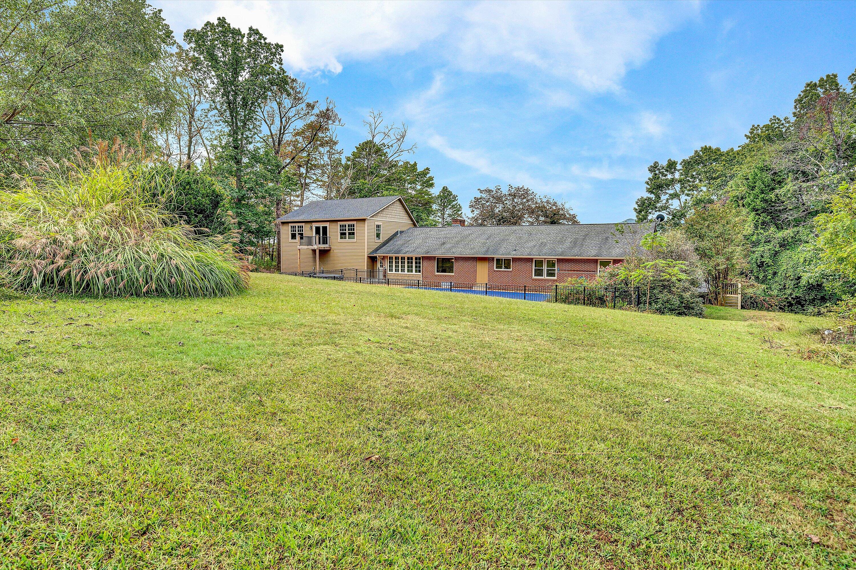 83 Springview Court Troutville, VA 24175 - Photo 58 of 74 a view of a house with a big yard and large trees