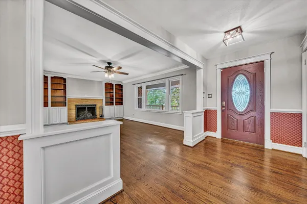 a view of an empty room with a window