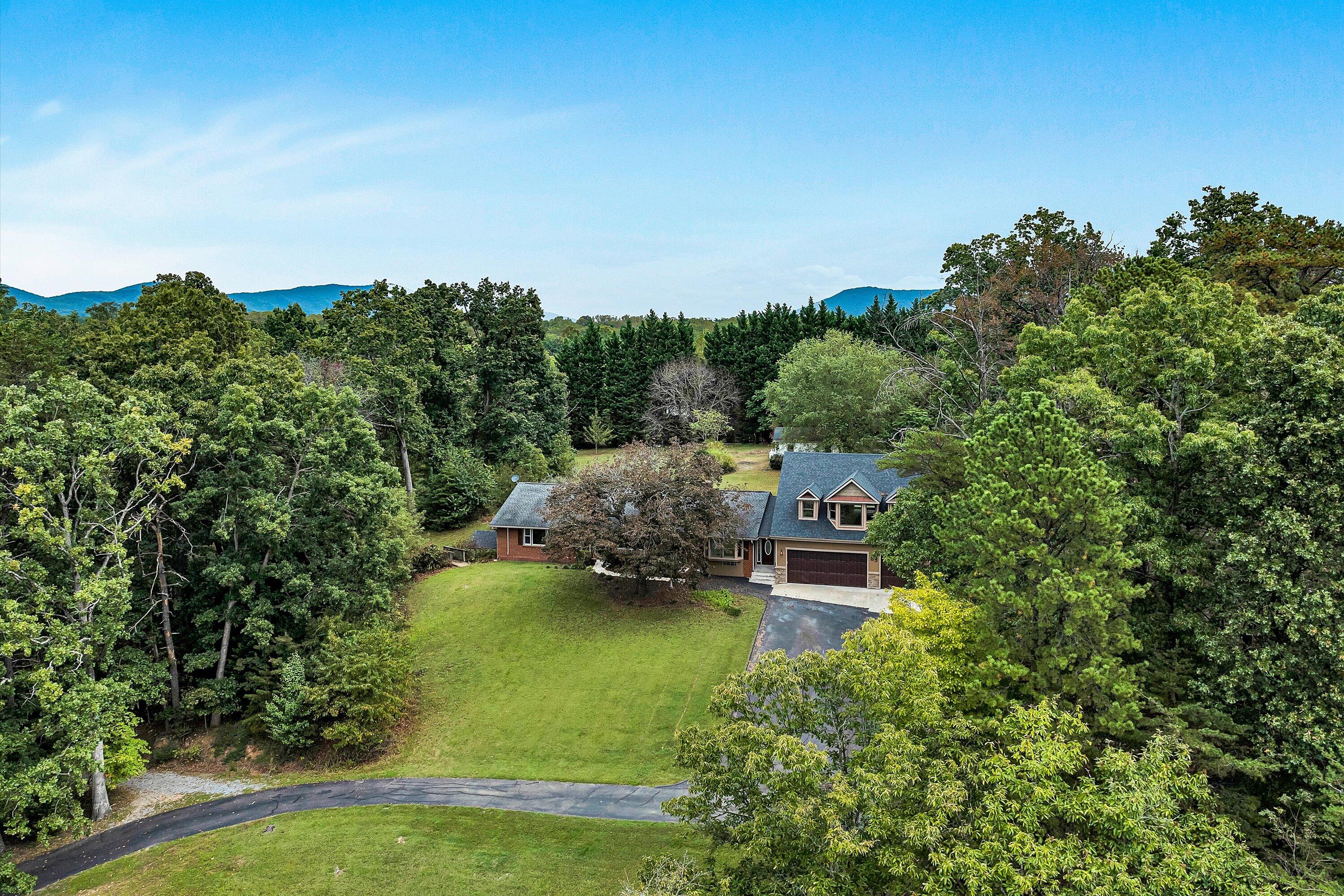 83 Springview Court Troutville, VA 24175 - Photo 64 of 74 an aerial view of a house with a garden