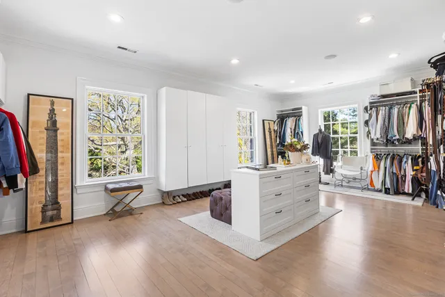 a view of living room with furniture and window