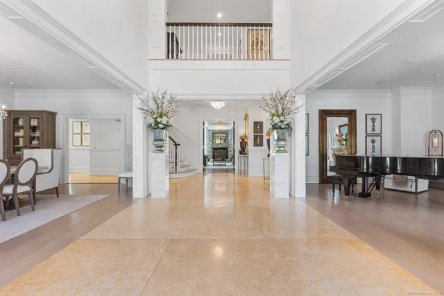 a view of a livingroom with furniture and windows