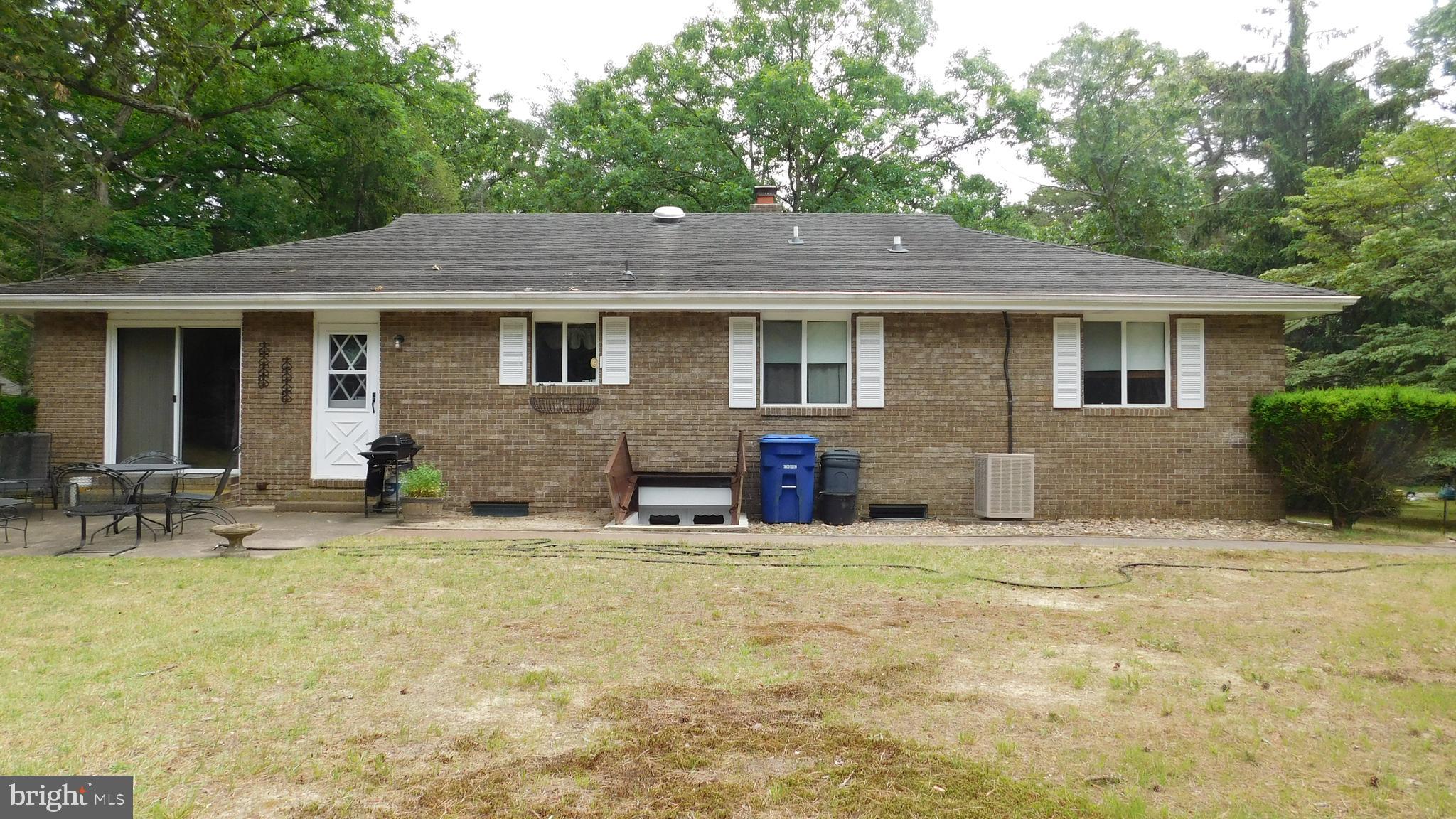 49 Lakeview Drive Tabernacle, NJ 08088 - Photo 23 of 28 Exterior back yard with bilco doors to lower level