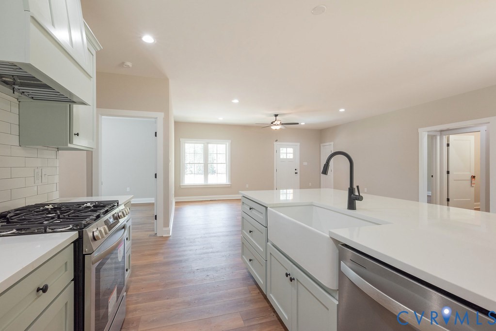 2349 Wickham Road Bumpass, VA 23024 - Photo 18 of 47 Kitchen featuring stainless steel appliances, cust