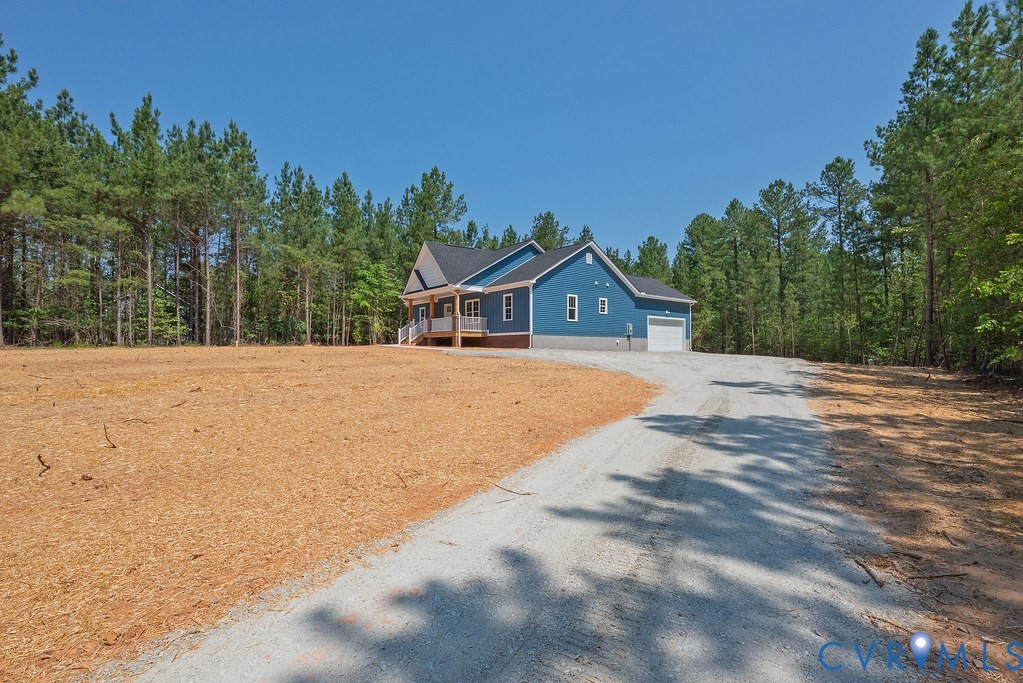2349 Wickham Road Bumpass, VA 23024 - Photo 4 of 47 View of front of house featuring gravel driveway,