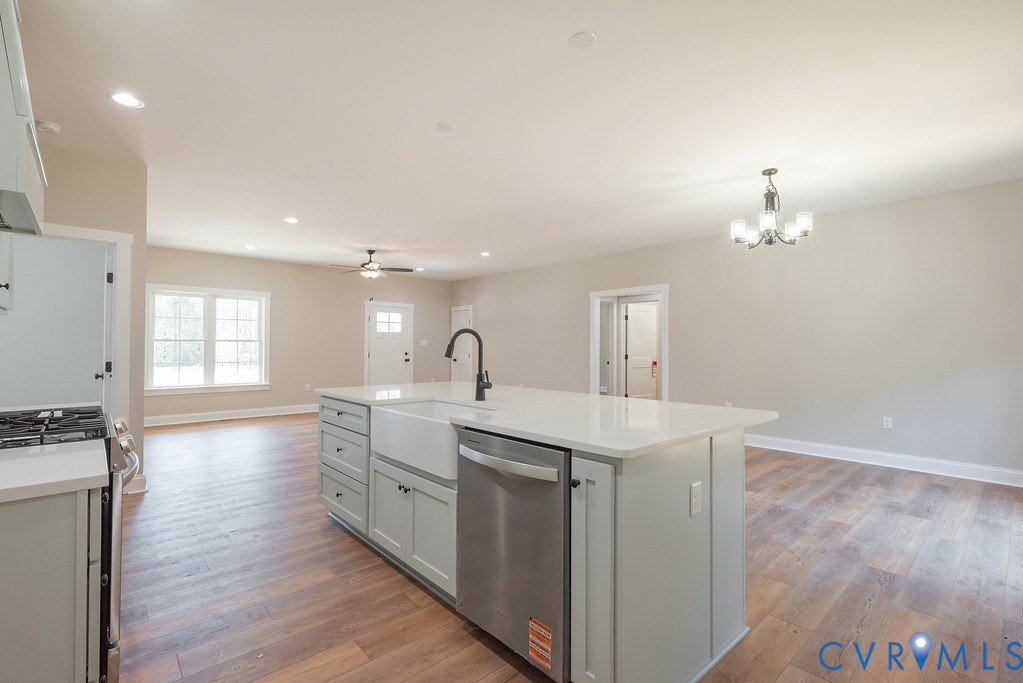 2349 Wickham Road Bumpass, VA 23024 - Photo 47 of 47 Kitchen featuring open floor plan, light wood fini