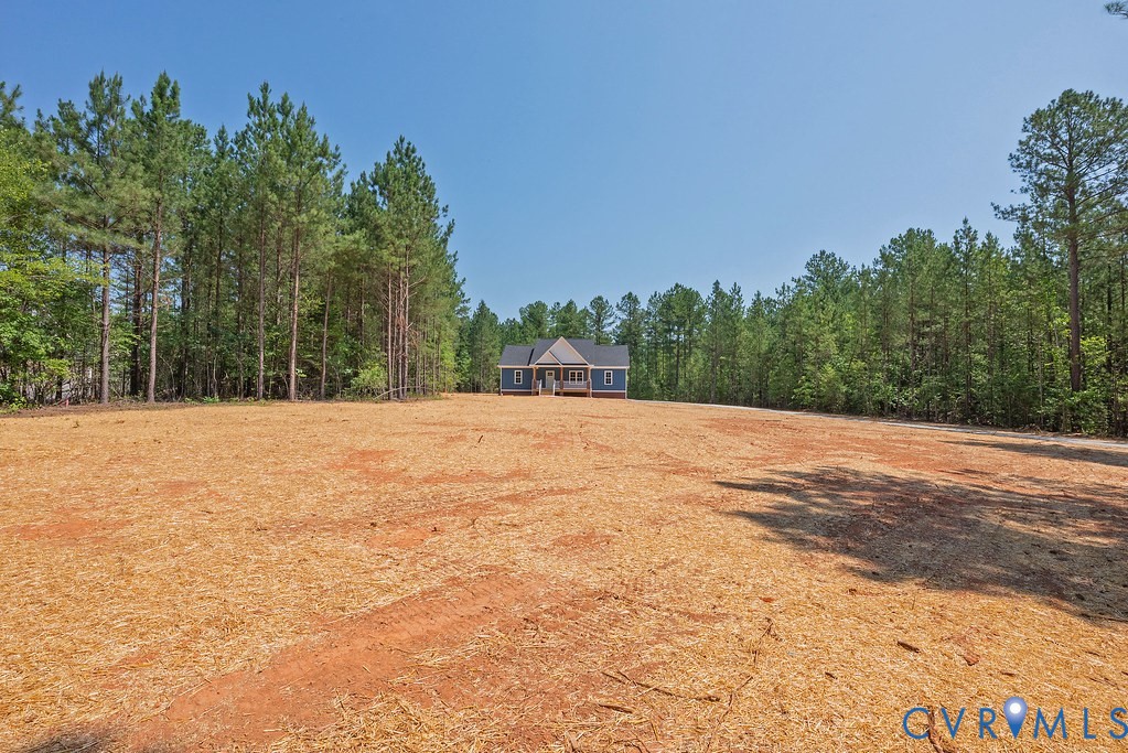 2349 Wickham Road Bumpass, VA 23024 - Photo 46 of 47 View of yard with a forest view
