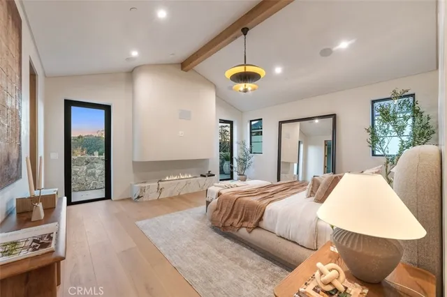 a view of walk in closet and window