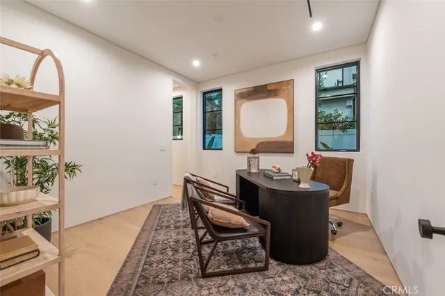 a view of a house with swimming pool and porch with furniture