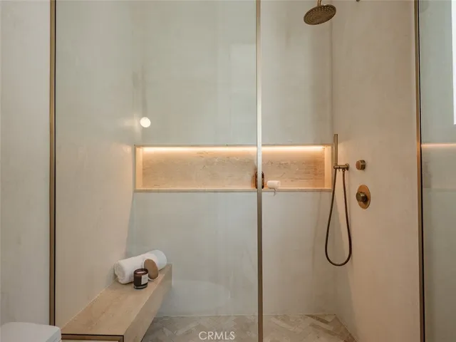 a bedroom with a bed and a table