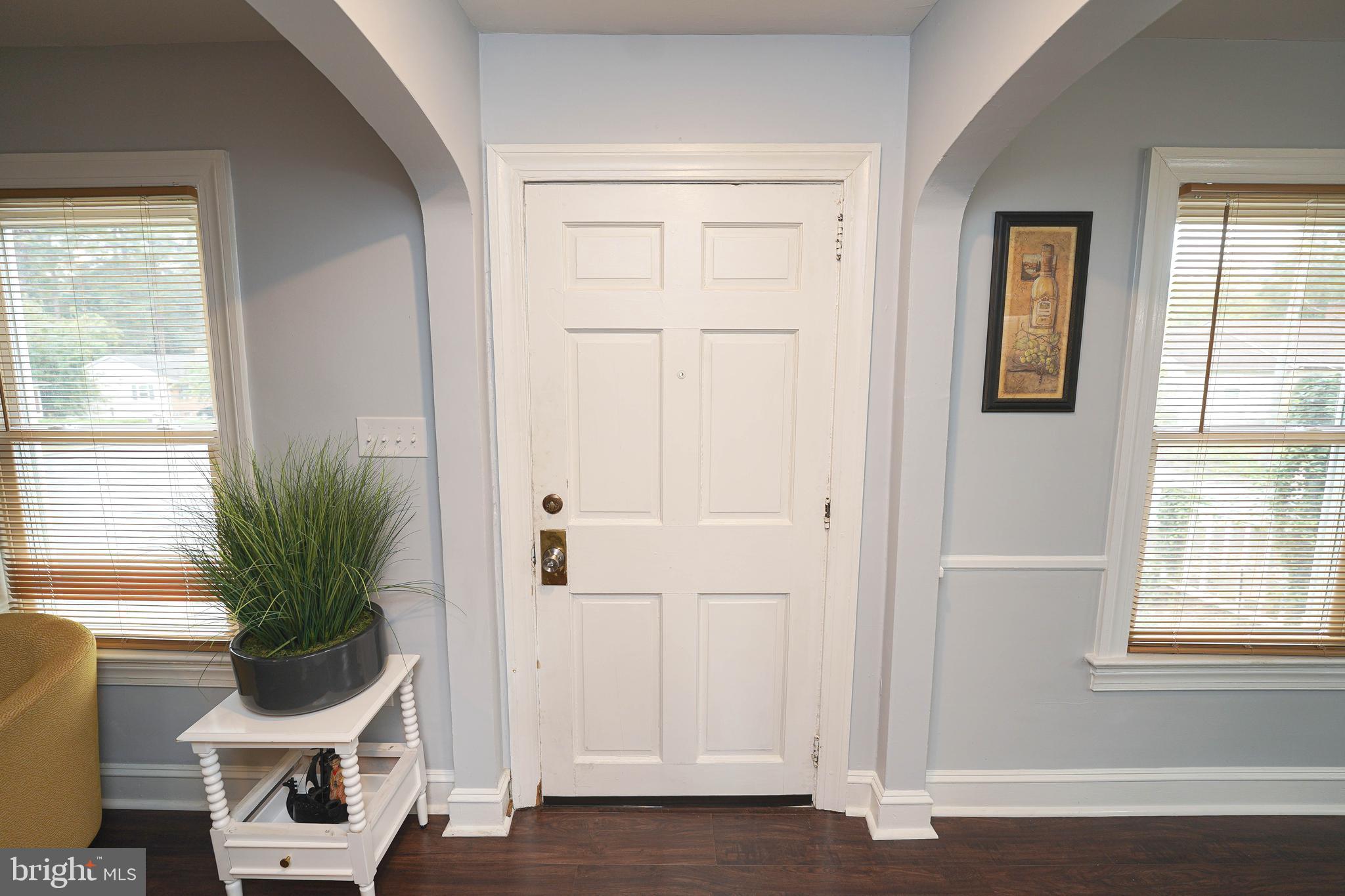 815 Federal Street Salisbury, MD 21801 - Photo 4 of 43 a view of a small space with wooden floor and a window