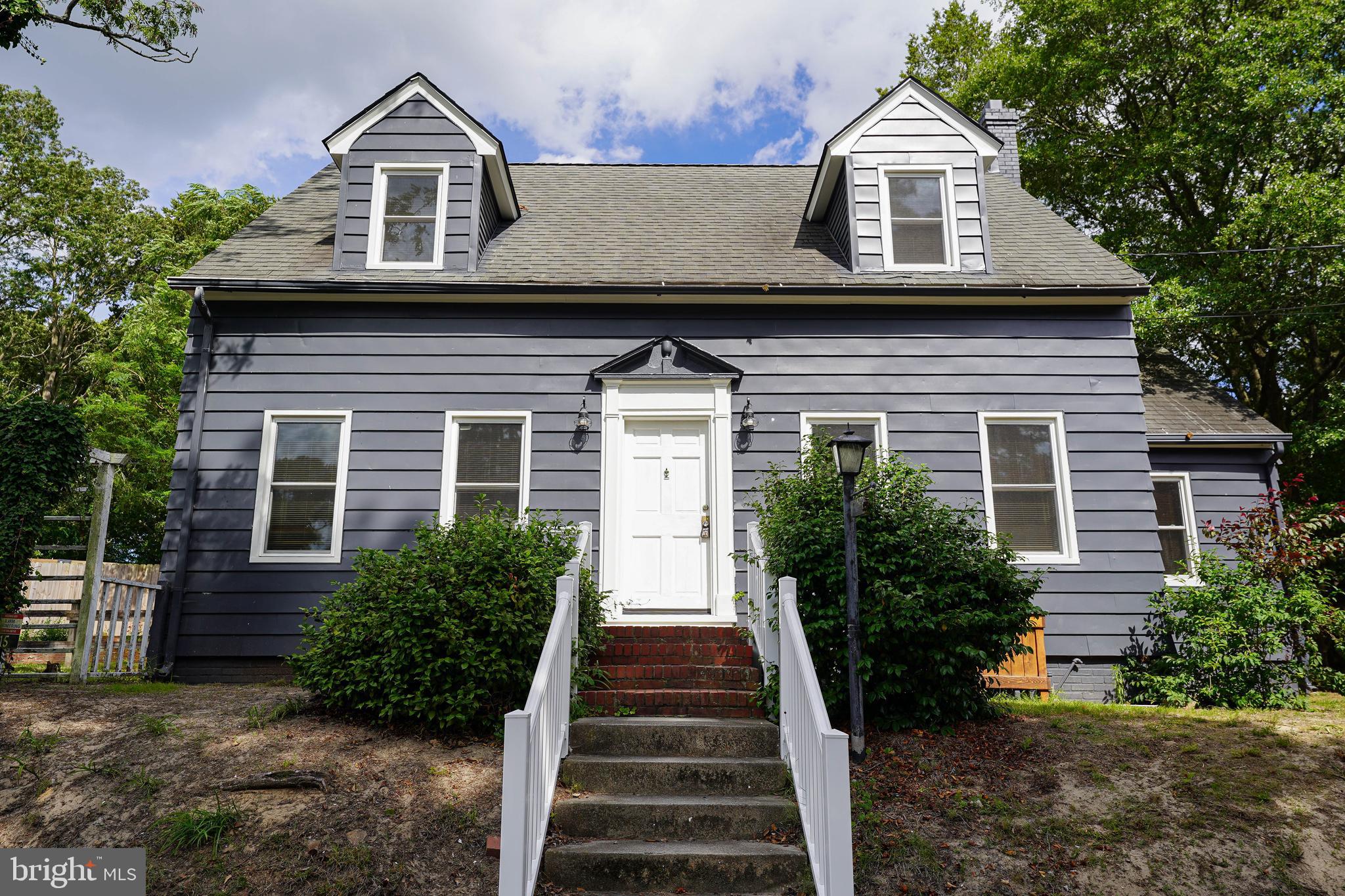 815 Federal Street Salisbury, MD 21801 - Photo 42 of 43 a front view of a house with a yard